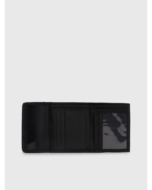 Portefeuille 3 volets anti-RFID Calvin Klein pour homme en coloris Black