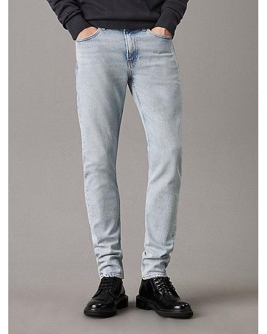 Slim Tapered Jeans Calvin Klein de hombre de color Gray