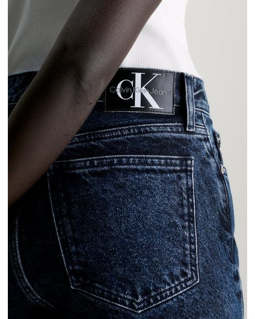 Jean bootcut à base fendue Calvin Klein en coloris Blue