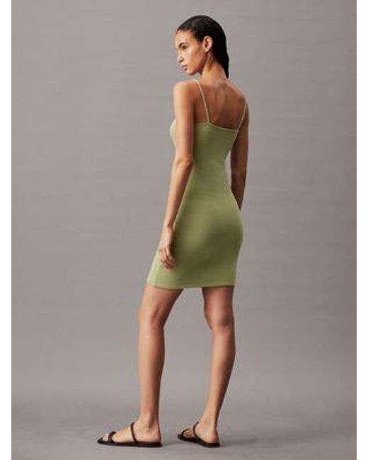 Vestido corto slim de punto texturizado Calvin Klein de color Green
