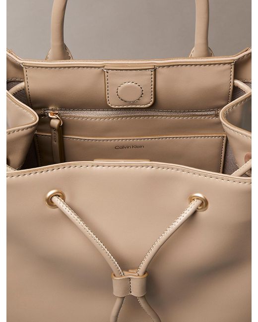 Calvin Klein Natural Monogram Drawstring Backpack