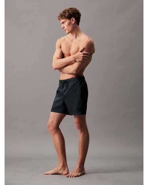 Short de bain mi-long indéchirable avec cordon de serrage Calvin Klein pour homme en coloris Black