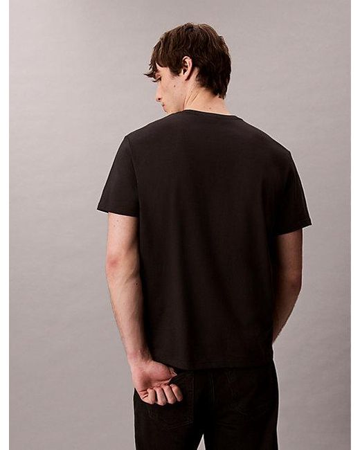 Calvin Klein Black Jeans Flagship Cities Graphic Relaxed T-Shirt for men