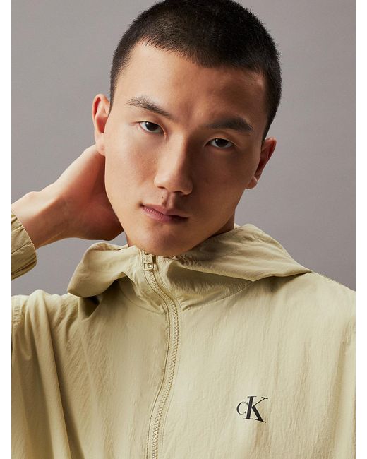 Coupe-vent à capuche relaxed en nylon Calvin Klein pour homme en coloris Natural
