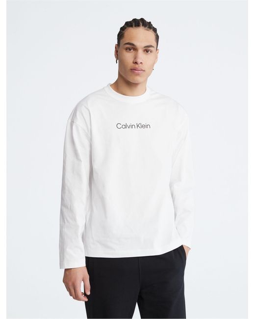 Calvin Klein Relaxed Fit Standard Logo Crewneck Long Sleeve Tee in ...