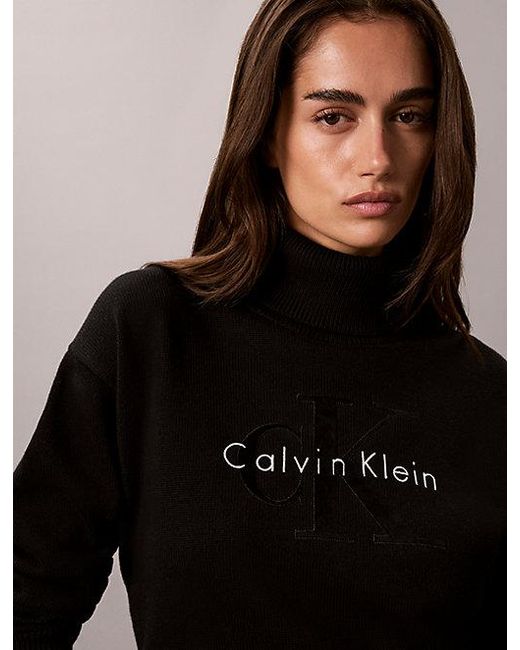 Calvin Klein Black Jeans Monologo Turtleneck Jumper