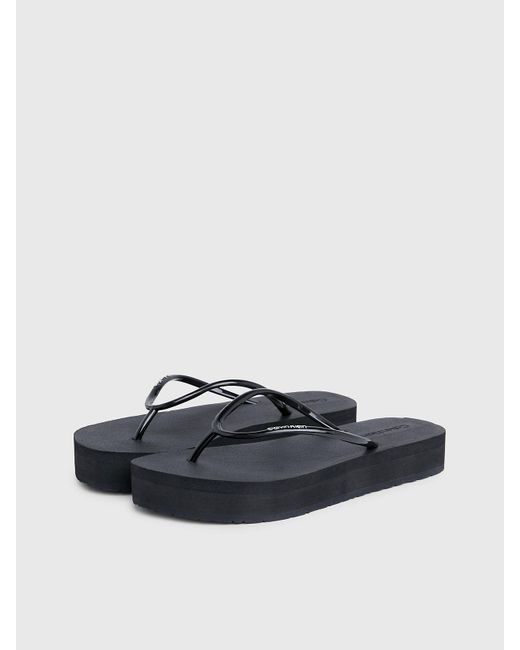 Calvin Klein Black Platform Flip Flops