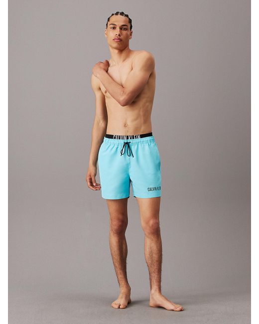 Short de bain avec double ceinture - Intense Power Calvin Klein pour homme en coloris Blue
