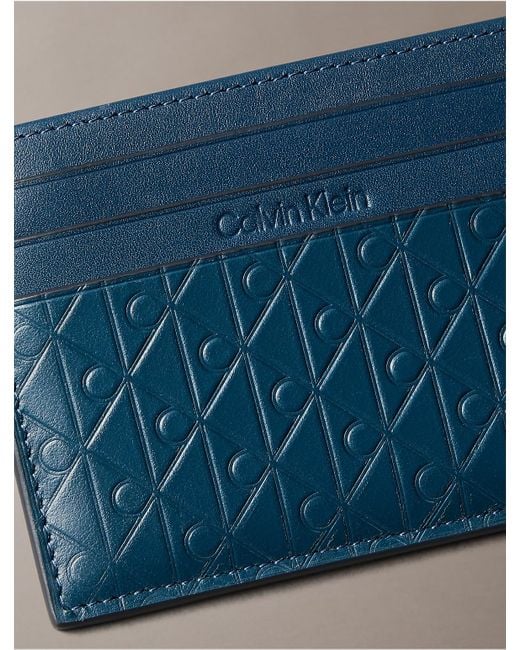 Calvin Klein Blue Embossed Allover Monogram Card Case for men