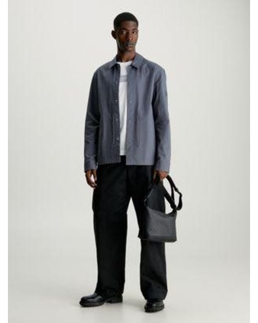 Bandolera con logo Calvin Klein de hombre de color Black