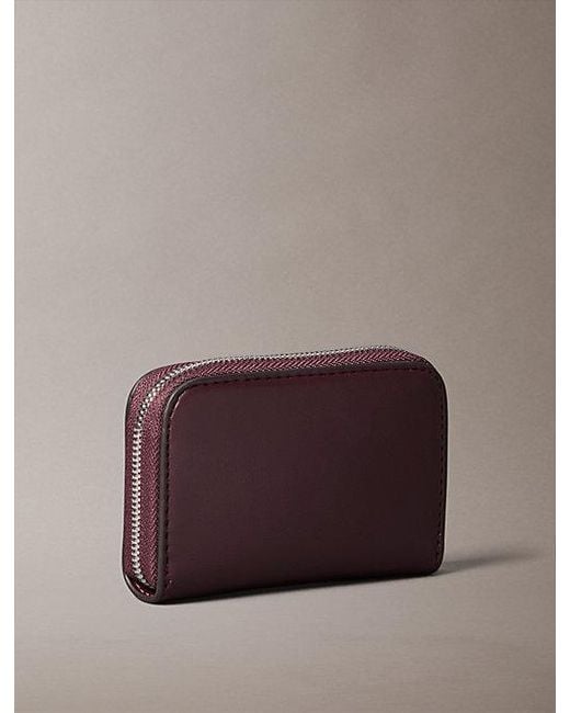 Calvin Klein Brown Embossed Monogram Zip Wallet