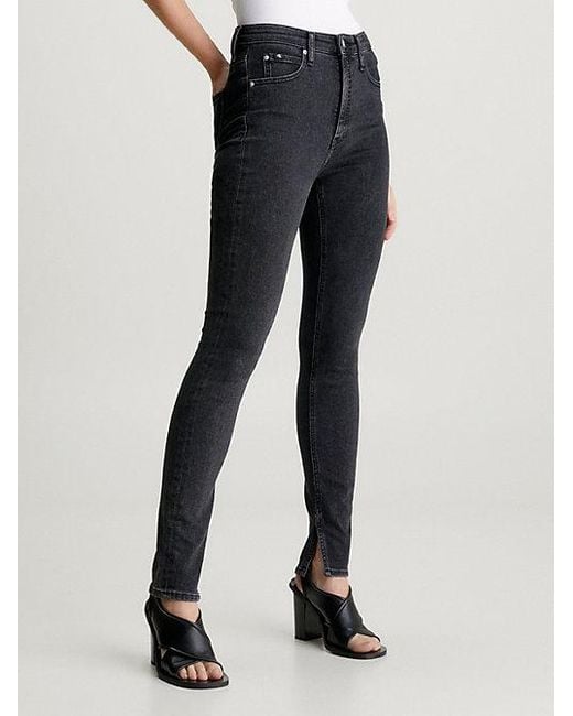 High Rise Skinny Jeans Calvin Klein de color Black
