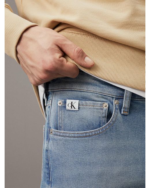 Slim Tapered Jeans Calvin Klein pour homme en coloris Gray