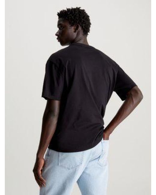 Camiseta holgada con logo gráfico Calvin Klein de hombre de color Black