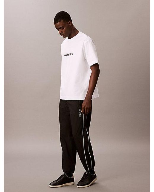 Calvin Klein Trainingshose Aus Nylon Mit Relaxter Passform in Natural für Herren
