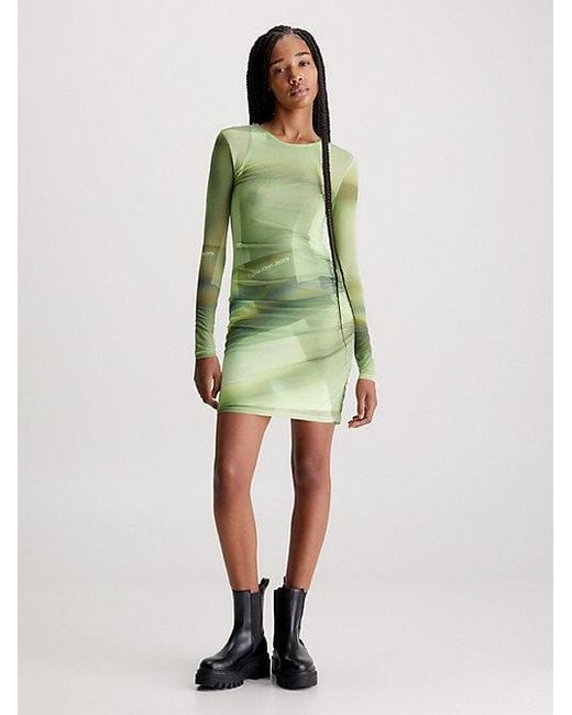 Vestido estampado de malla de dos capas Calvin Klein de color Green