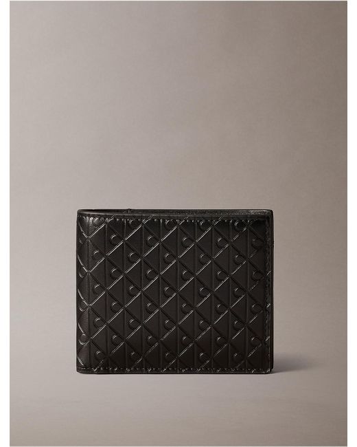 Calvin Klein Gray Embossed Allover Monogram Bifold Wallet With Coin Pouch for men