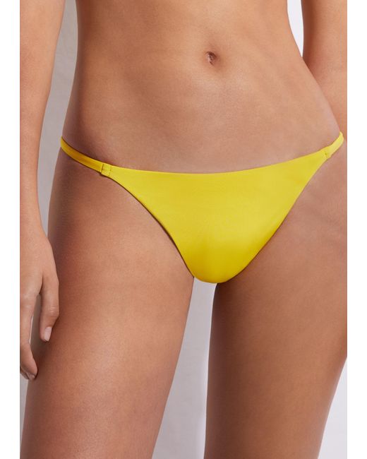 Tanga bikini indonesia eco Calzedonia de color Amarillo | Lyst