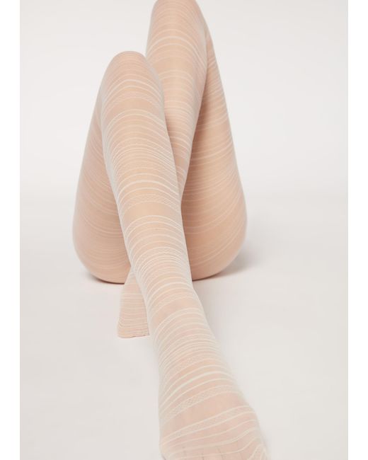 Collant retina 30 denari motivo righe di Calzedonia in Neutro | Lyst