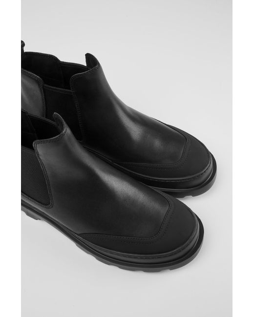 camper black boots