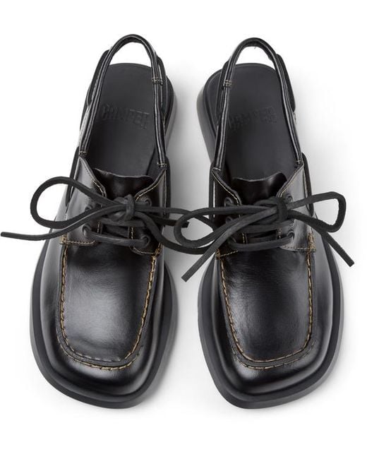 Camper Black Clogs