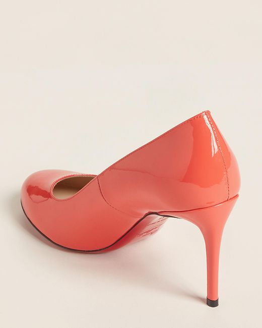 louboutin orange sneaker