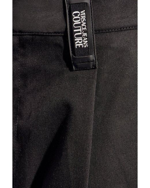 Versace Black Logo Patch Pleated Trousers for men
