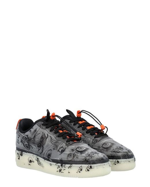 lacing up black air forces