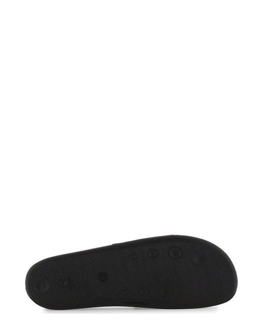 Moschino Black Logo Embossed Slip-on Sandals