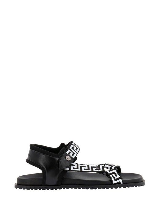 Versace Black Logo Embossed Flat Sandals for men