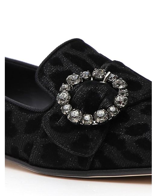 black and leopard print loafers