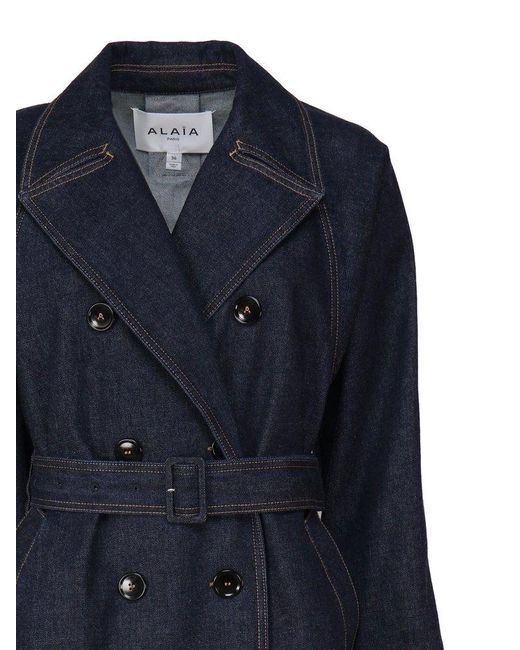 Alaïa Double-Breasted Belted Denim Trench Coat in Blue | Lyst UK