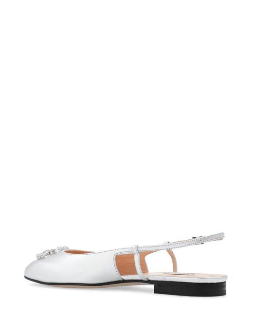 Gucci Logo Embellished Metalic Slingback Flats in White | Lyst