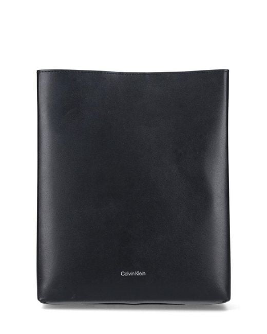 Calvin Klein Logo Stamp Crossbody Bag in Black | Lyst