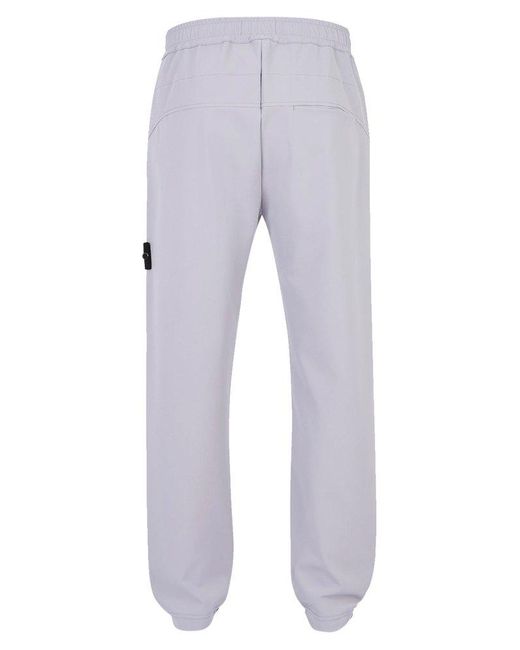 Stone Island Blue Compass Patch Track Trousers for men