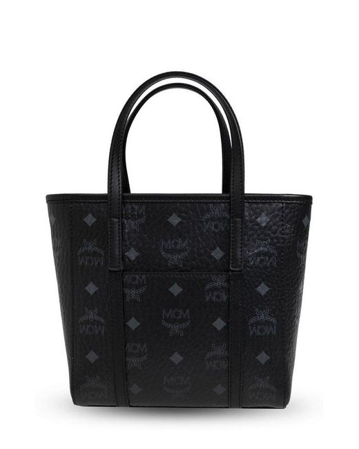 MCM Monogrammed Logo Plaque Tote Bag in Black Lyst UK