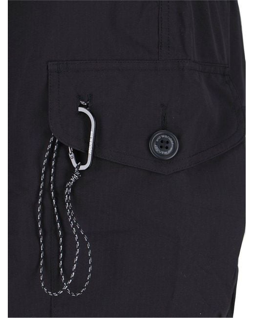 And Wander Blue Oversized Cargo Belted Shorts for men