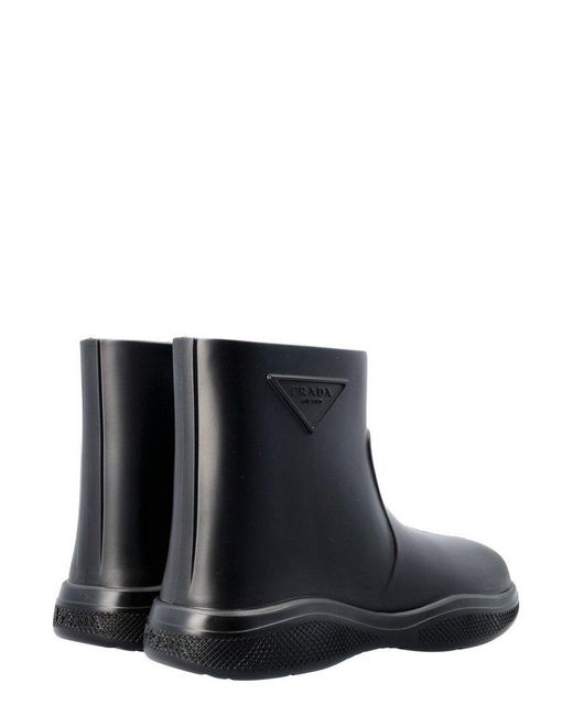 Prada Rubber Logo Embossed Slip-on Rain Boots in Black | Lyst