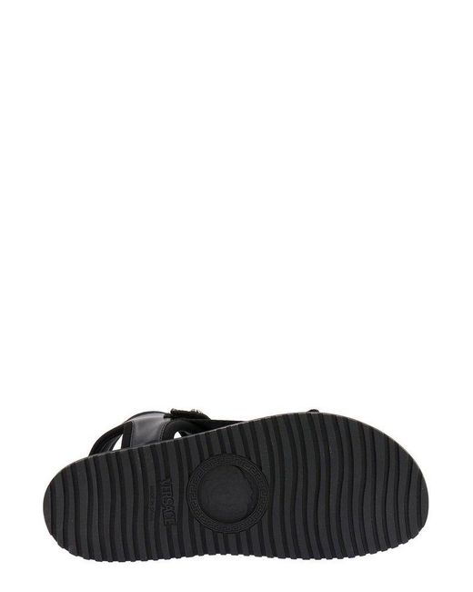Versace Black Logo Embossed Flat Sandals for men