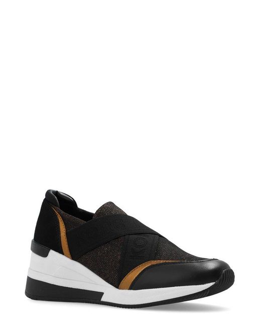 Michael kors sales wedge tennis shoes