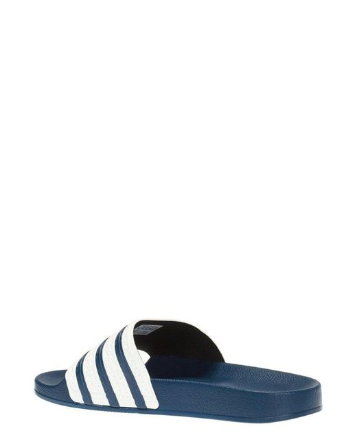 adidas Originals 'adilette' Slides in Blue for Men | Lyst