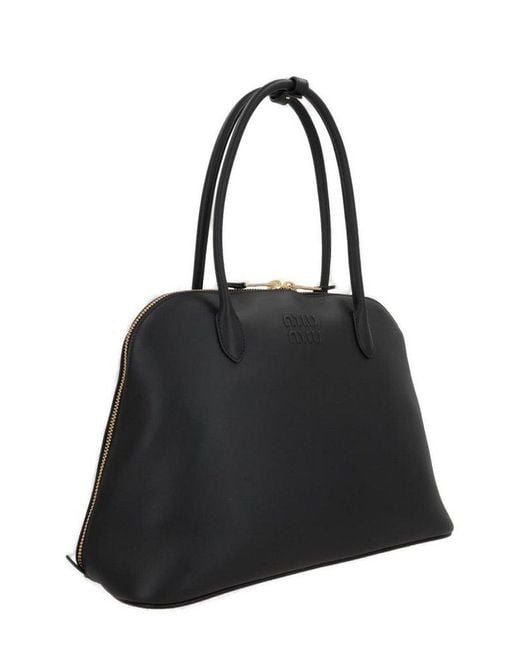Miu Miu Logo-Embossed Zipped Shoulder Bag in Black | Lyst