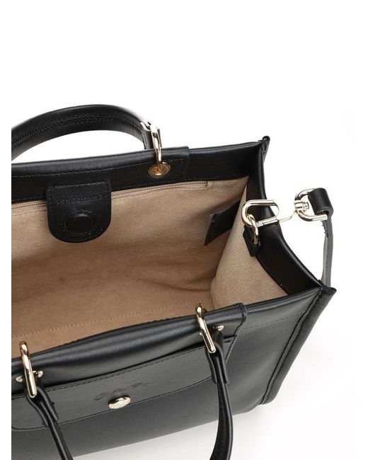 Longchamp Black Handbag With Embossed Logo On The Front And Adjustable And Removable Shoulder Strap