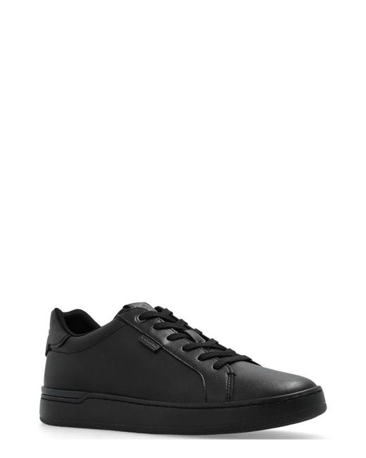 COACH Logo Embossed Low-top Sneakers in Black | Lyst