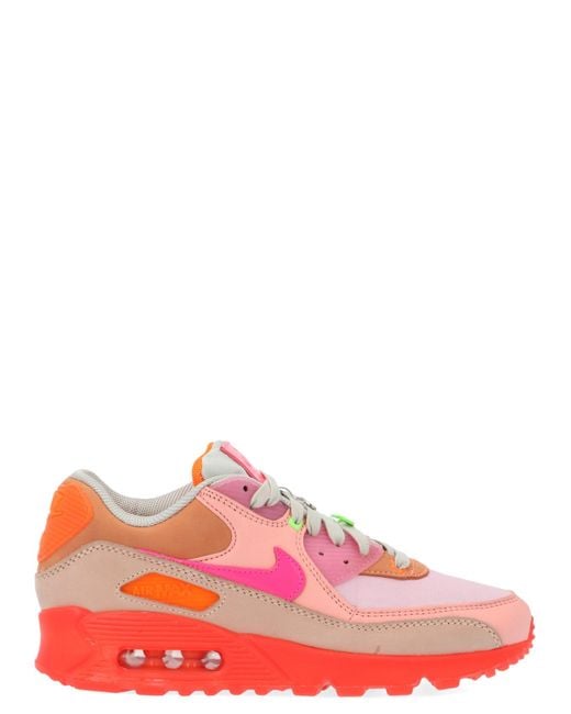 Nike Pink And Orange Air Max 90 Sneakers With Layered Design And Integrated Air Technology.