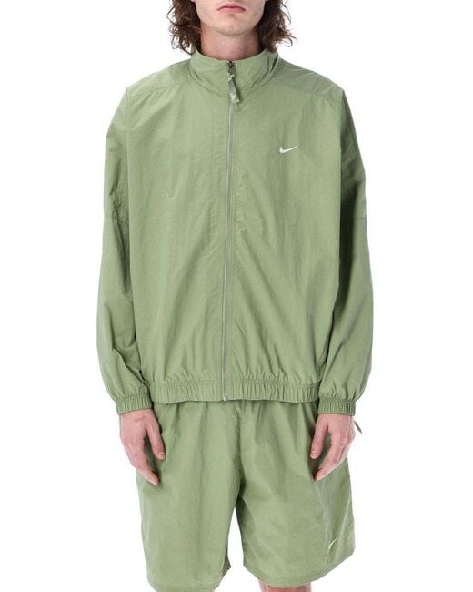 Nike Solo Swoosh Zip-up Track Jacket in Green for Men | Lyst Canada
