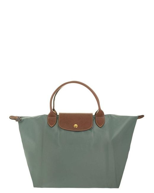 Longchamp Synthetic Le Pliage Medium Top Handle Bag in Green | Lyst