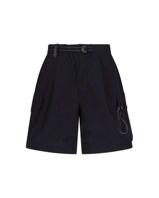 And Wander Blue Oversized Cargo Belted Shorts for men