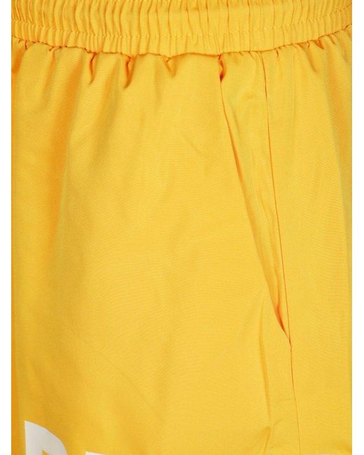 Represent Yellow Logo Printed Swim Shorts for men