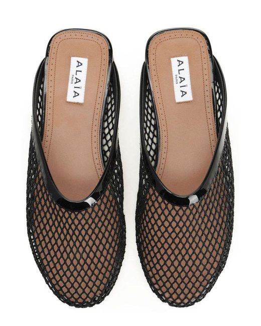 Alaïa Fishnet Mules in Black | Lyst